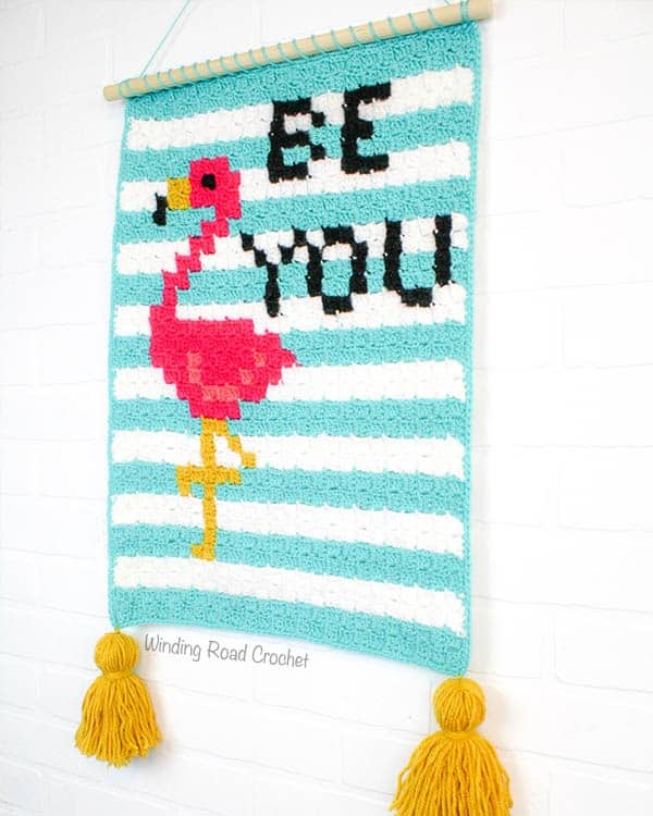 Find your Flock: Be You Flamingo Wallhanging is a fun corner to corner crochet project that will inspire you everytime you look at it. The C2C graph and written pattern are included. Plus tips and instructions for making your wallhanging look finished. Free crochet pattern. #freepattern #flamingo #crochet #C2C #cornertocorner #wallhanging