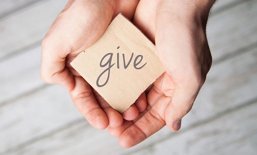 Phrasal verb with give