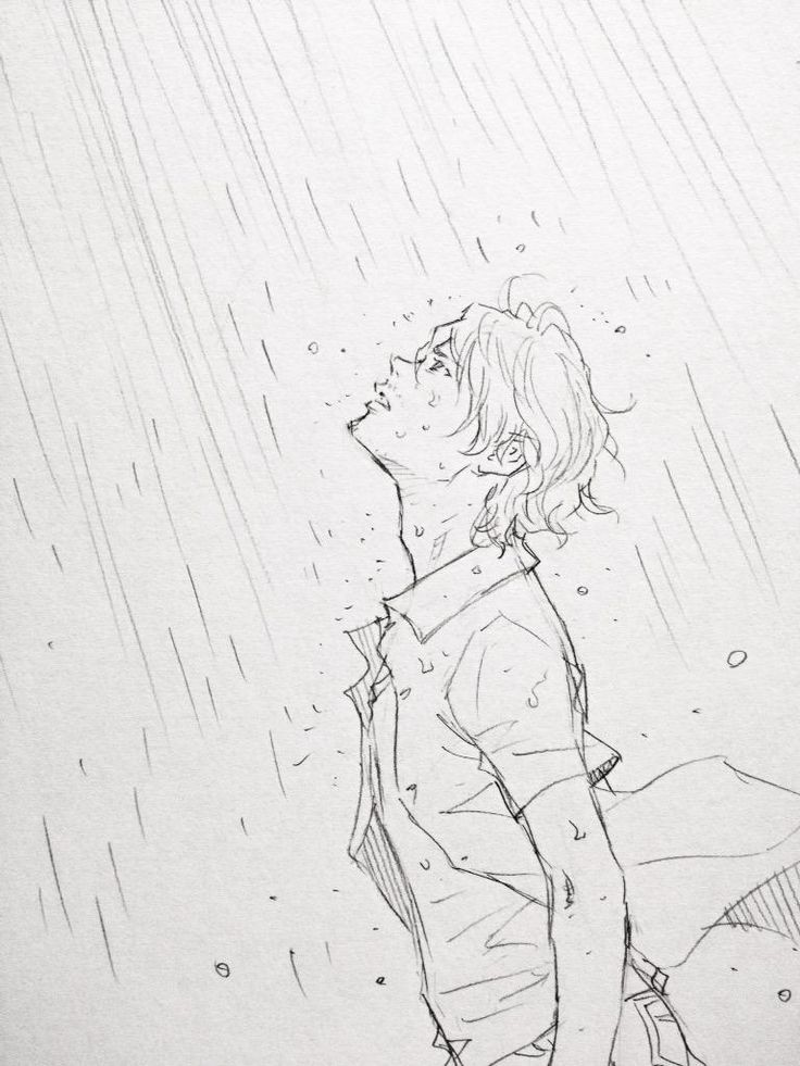 chàng trai buồn dưới cơn mưa