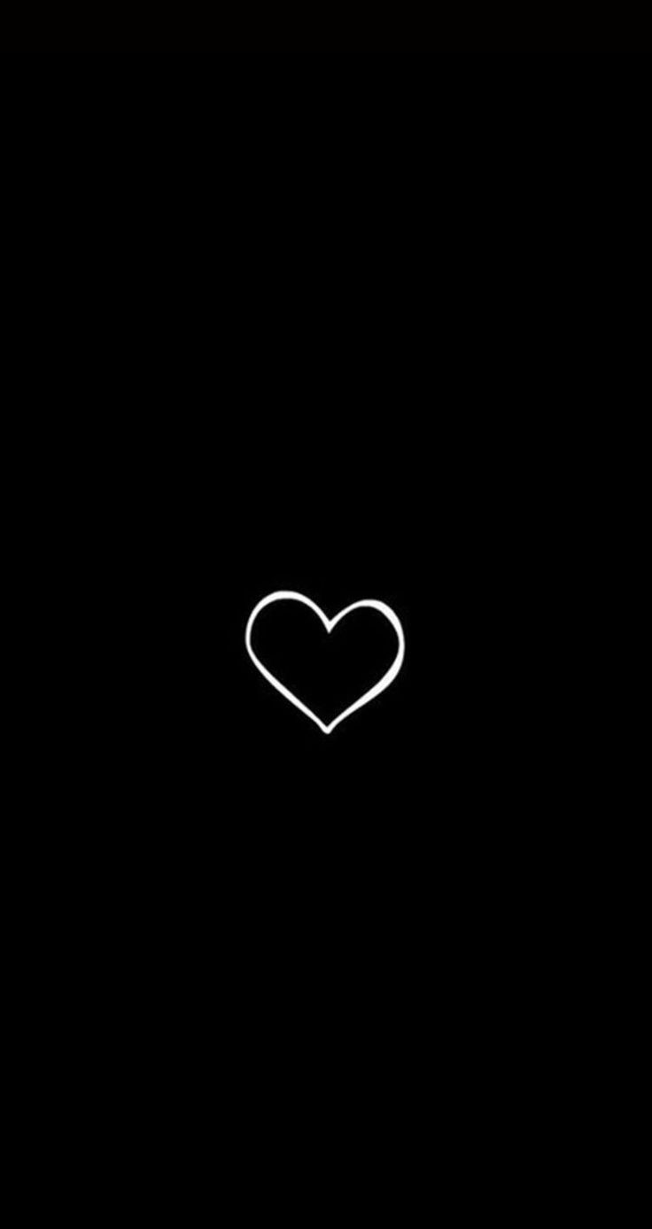 hình nền 1 trái tim ở giữa background đen